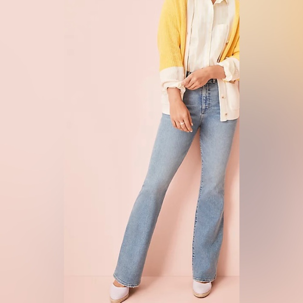 NWT Destructed Mid Rise Boot Jeans